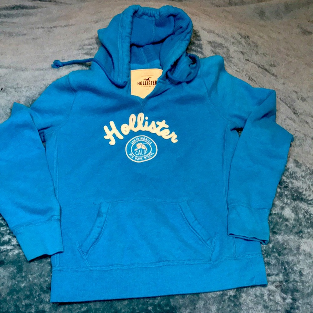 Fits more like a kids or teens large or a women’s XS. Hollister hoodie.